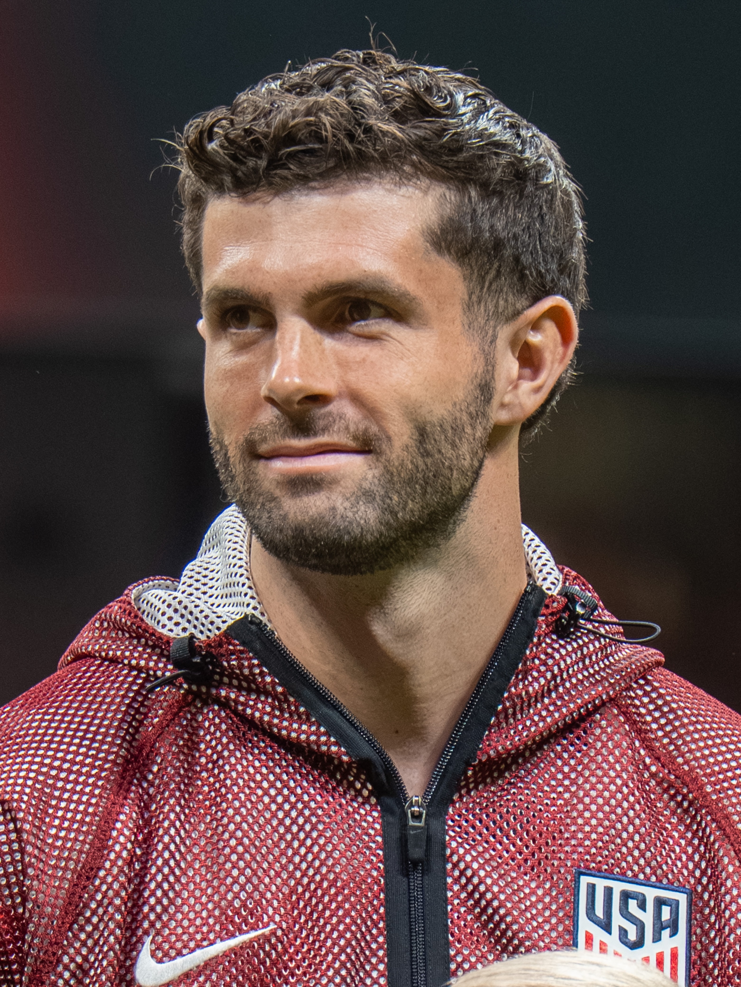 Christian Pulisic in USA warmup gear, the face of the host nation the model rates as underdogs